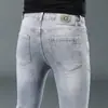 Jeans de alta calidad para hombre de Hong Kong, otoño e invierno 2026, negros y grises, elásticos, corte slim, pantalones largos casuales de alta gama