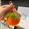 Novo pingente de caqui imitação de pelo de coelho rex chaveiro de coisas boas acontecem pingente fofo acessórios de bolsa de pelúcia atacado