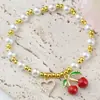 Pulsera de Cereza con Perlas para el Día de la Madre Transfronteriza Pulsera de Perlas Personalidad de Nicho Fresas con Goteo de Aceite Joyería de Mano Redonda con Perlas