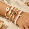 Nuevo brazalete de playa estilo vacaciones de verano europeo y americano con estrella de mar, concha y perla, brazalete de cordón tejido elástico para mujer, venta al por mayor