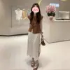 Moda Verano 2026 Top de Manga Corta con Nudo Retorcido y Dobladillo con Abertura Falda de Lunares Versátil Traje Elegante para Mujer