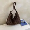 Bolso de nicho de estilo coreano transfronterizo con estampado de leopardo, nuevo bolso de hombro casual y relajado de otoño, bolsa de mano de gran capacidad para el trabajo