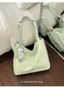 Bolsa de mano de gran capacidad, bolso de mano moderno y versátil para el trabajo, nuevo modelo de comercio exterior, bolso de mano y de hombro multifuncional de doble uso para mujer