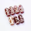 Cuentas dzi de ágata rojo con pátina de alto contenido de aceite de nueve ojos estilo Tíbet con contraste de color claro, cuentas sueltas con múltiples patrones, accesorios decorativos para pulseras al por mayor