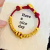 Tienda de Oro Mismo Estilo Arena Oro Punto Diamante Amarillo Dios de la Riqueza Serpiente Retorcida Envuelto en Cuerda Roja Pulsera Pulsera del Año de Nacimiento del Zodiaco Serpiente para Mujer