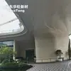 Componentes de muro cortina curvos de UHPC de Guangdong Huaxiong, muro exterior de hormigón visto curvo, paneles prefabricados para la fachada del moderno centro de exposiciones de la ciudad