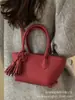 Bolso de Mano de Moda de Gama Alta 2026 Nuevo Modelo Versátil para el Trabajo Cruzado Bolso Cubo Pequeño Exquisito de Moda