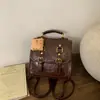 Mochila de Moda para Mujer 2025 Otoño e Invierno Nueva Nicho Alto Valor Retro Moda Mochila de Viaje Tendencia