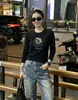 Tienda Física Guangzhou Shisanxing Fuente Hilo de Algodón Camiseta de Manga Larga para Mujer, Parte Superior Base Directa de Fábrica, Suministro Exclusivo Segunda Remesa de Verano