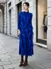 Venta caliente transfronteriza Miyake alta gama sentido volantes vestido midi mujer otoño temperamento estilo suave elegante falda de manga larga