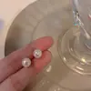 2025 Nueva Moda Explosiones Combinable Simple Aretes de Perlas Femeninos Elegantes Diseño Nicho Avanzado Aretes de Tuerca