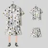 Camisa floral de manga corta, Ropa de playa de Hainan, Estilo hawaiano de Sanya, Conjunto de pantalones cortos finos de verano para hombre y pareja de viaje a Tailandia