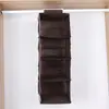 Fornecimento de fábrica bolsa de armazenamento dobrável simples não tecida bolsa suspensa de quatro camadas bolsa de pendurar na porta bolsa de separação multicamadas