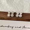 Novedoso Estilo Aretes Apilados con Diamantes Acabado Perla de Luz de Luna de Cristal Aretes de Flor de Perla Apilados con Diamantes Súper Brillantes
