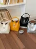 Bolso de Cubo de Mano Estilo Coreano Transfronterizo Simple y Moderno Bolso Cruzado Casual para Mujer Verano 2026 Bolso Tote Pequeño Casual