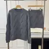 Conjunto de Suéter de Punto Estilo Perezoso de Moda para Mujer, Otoño e Invierno, Suéter Grueso de Punto Trenzado + Falda Corta Anti-Exposición Conjunto de Dos Piezas