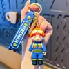 Llaveros de personaje de bombero de dibujos animados, policía de tránsito y policía, colgantes de personaje de goma suave, pequeños regalos conmemorativos, al por mayor en stock
