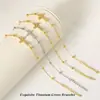Venta al por mayor del fabricante Pulsera de Acero de Titanio Cruzada Chapada en Oro de 18K para Mujer Cadena Cruzada Clip Pulsera de Bolas Joyería de Moda Popular