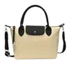 Bolsa Longxiang Popular Europeia e Americana Bolsa Feminina Mini de Mão com Padrão Bolsa de Mão Fashion Versátil Bolsa de Ombro Transversal