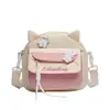 Bolsos cruzados de lona al por mayor para niñas, bolsos de hombro lindos y dulces, bolsos cruzados para estudiantes suaves y frescos