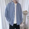 Camisa de manga larga a rayas estilo Hong Kong y japonés, casual y versátil, nueva camisa de otoño para hombre, prenda exterior elegante y moderna