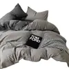 Juego de ropa de cama minimalista estilo nórdico de cuatro piezas, sábana de tela cepillada para cama de dormitorio, color liso, amigable con la piel, juego simple de tres piezas para estudiantes
