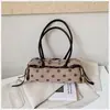 Bolso de axila de lunares estilo coreano de nicho para mujer, nuevo de moda otoño 2026, versátil, de alta gama, para ir al trabajo, de hombro y cruzado