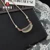 Collar Natural Color Hielo Ojo de Gato Sonrisa Tubo Curvo Clavícula para Mujer Cuerda Tejida a Mano Estilo de Diseño de Alta Gama Collar al por Mayor