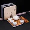 Caixa de Viagem Portátil Conjunto de Chá Kung Fu Cerâmica Peças de Chá Um Bule Quatro Xícaras Conjunto Completo Atacado Presente Logotipo