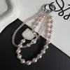 Cordão Curto de Celular de Luxo Leve com Pérola e Cristal Camada Dupla, Pingente de Bolsa Exquisito com Strass de Gato Cartoon