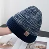 Gorro de punto con bloques de color y borde enrollado, etiqueta de cuero, sombrero versátil para otoño e invierno, estilo transfronterizo europeo y americano, gorro de punto casual versátil tipo slouchy