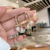 2024 Novos Brincos de Pedra Olho de Gato Folha de Ginkgo Moda Elegante Versátil Brincos Femininos Únicos de Nicho Atacado