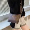 Bolsas femininas populares deste ano 2026 nova tendência moda retrô estampada bolsa transversal tipo balde bolsa de ombro de grande capacidade