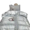 Juego de cuatro piezas de algodón lavado y fibra sintética, estilo sábana de rayas azul y blanco fresco, ropa de cama para edredón, estilo ins simple para dormitorio de verano