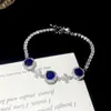 Pulseira Geométrica Redonda Flor de Zircônia Europeia e Americana Nova Nicho Luxo Leve Toque de Alto Padrão Pulseira Moda Diária Joia de Mão para Mulheres