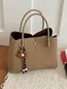 Elegante y estilosa cartera pequeña para mujer, nuevo bolso cruzado versátil de moda 2026, bolso de mano para el trabajo, bolso tipo cubo tote