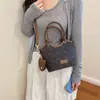 Bolso de mujer vintage de alta gama y nicho, nuevo y moderno bolso de hombro de moda 2026, bolso cruzado tipo cubo versátil
