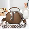 Nova Bolsa Pequena Redonda com Franjas Transfronteiriça Versátil Bolsa de Ombro de Mão Bolsa Transversal Popular Bolsa Pequena Feminina Bolsa de Moda de Nicho