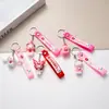 Llavero Colgante Sanrio Dibujo Animado Flor de Cerezo Colgante de Kuromi Llavero Ciudad Arcade Pequeños Regalos Promocionales Al por Mayor