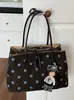 Bolso de mano de lona con lunares de gran capacidad para mujer, nuevo modelo 2026, de alta gama, lujo ligero, bolsa tote de nicho para el trabajo