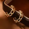 Brincos de Liga de Moda Transfronteiriços Europeus e Americanos Brincos Estilo Retro de Hong Kong Brincos de Luxo Leve Femininos Novos Brincos Modernos Agulha de Prata Luxo Leve