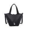 Bolso de diseño de nicho de moda para mujer 2026 nuevo bolso de mano popular de celebridad de internet bolso cubo versátil