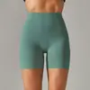 Pantalones de yoga de estilo nuevo sin línea de vergüenza color piel para mujer, cintura alta, realce de glúteos, compresión abdominal, shorts deportivos de tres puntos