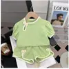 Conjunto de Ropa de Verano para Niñas: Elegante Conjunto de Dos Piezas para Niños, Marca de Moda, Camiseta con Botones Florales y Mangas Abullonadas con Pantalones Cortos