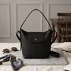 Bolso de mano de alta gama con estampado de lichi para mujer, nuevo estilo 2026, bolso tipo cubo de gran capacidad, versátil para ir al trabajo, bolso de hombro, bolso cruzado, transfronterizo