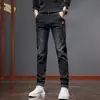 Jeans Masculino Stretch Outono e Inverno Novo Retro Americano Tendência Versátil Slim Fit Forrado com Lã Resistente ao Desgaste Calças Casuais