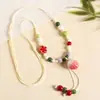 Collar con colgante de campana de mariposa de cerámica de estilo étnico retro para mujer, diseño nuevo y moderno, cadena larga para suéter, accesorios