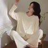 Conjunto de dos piezas de pijama de algodón puro al por mayor para mujer, manga larga, pantalón largo, cuello redondo, cárdigan de encaje, adecuado para transmisión en vivo, ropa de casa transfronteriza, se puede usar en el exterior