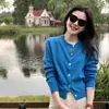 Jaqueta Cardigan de Tricô Amarela de Manga Longa Feminina 2025 Primavera e Verão Nova de Alto Padrão com Temperamento Casual Emagrecedor Tricô Top