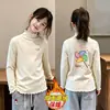 Blusa Térmica de Felpa para Niñas con Cuello Volante Otoño Invierno 2026 Nuevo Estilo para Niños Medianos y Mayores Cuello Alto Capa Base Cálida Blusa Casual